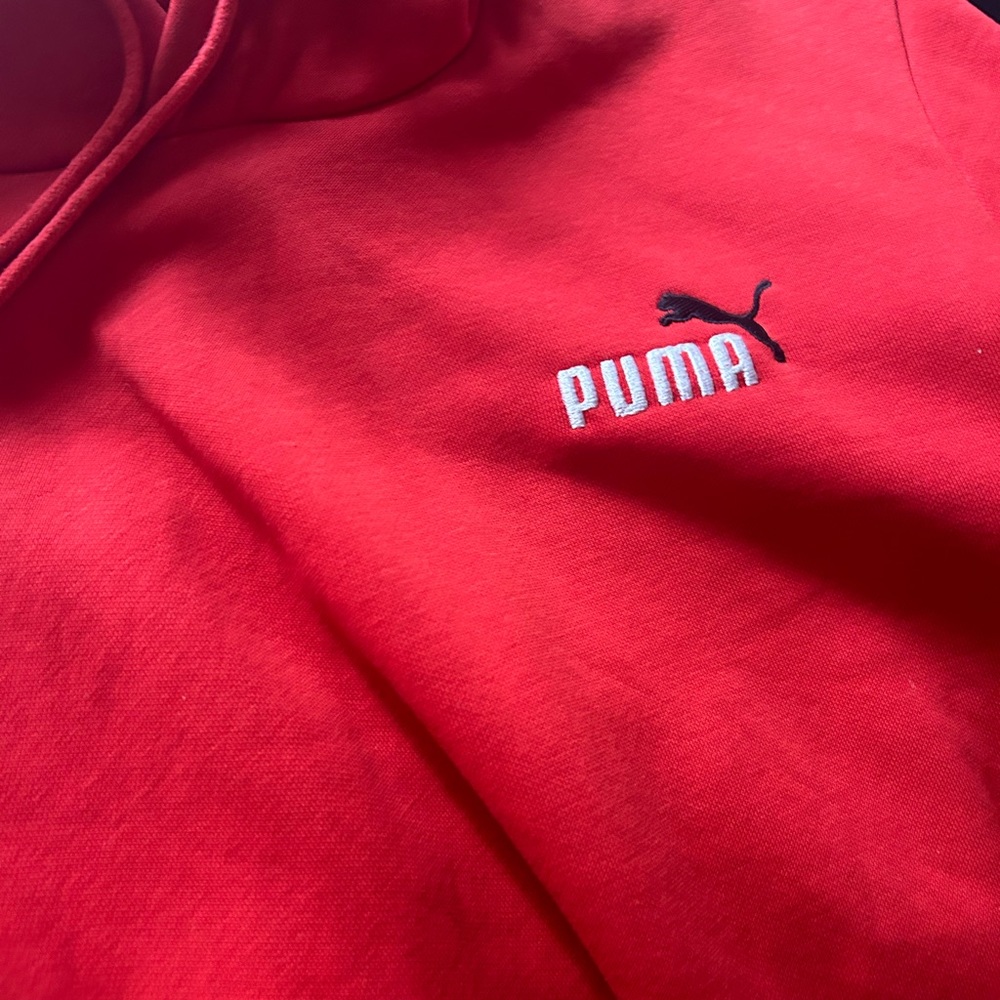This is an red puma hoodie lightly used